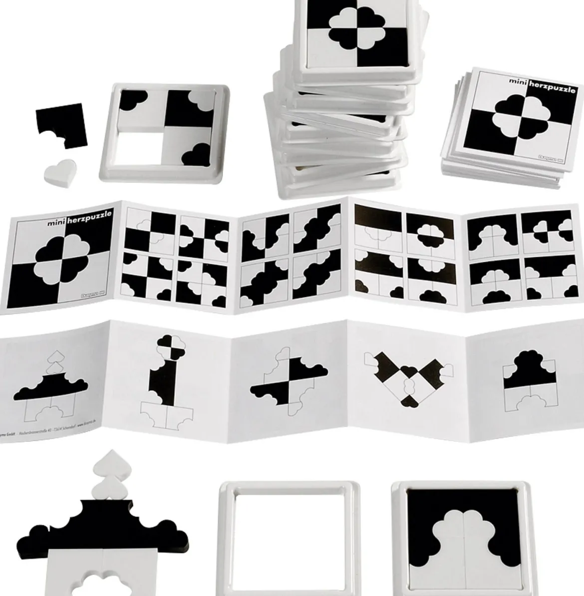 Herzpuzzle mini s/w, 12 Stück, ab 3 Jahre